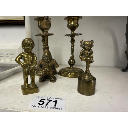 571 - A brass Lincoln imp candle snuffer, policeman door knocker, pair of candlesticks etc