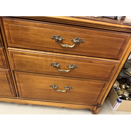 574 - A dark wood side by side 6 drawer chest