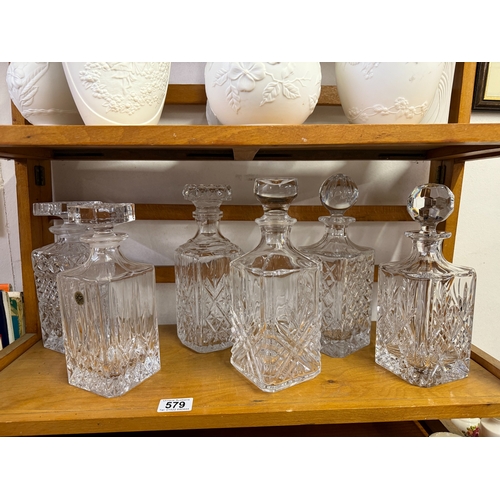 579 - 6 Glass decanters including Royal Crystal Rock