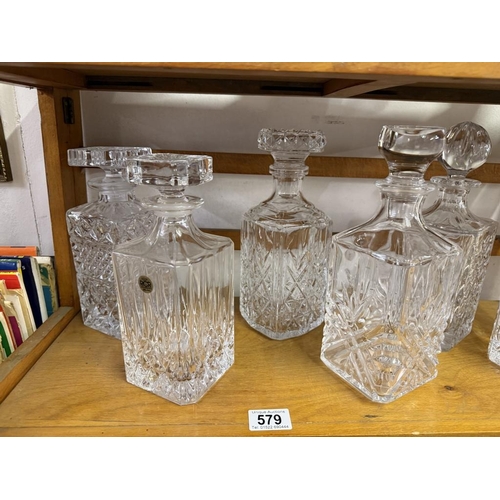 579 - 6 Glass decanters including Royal Crystal Rock