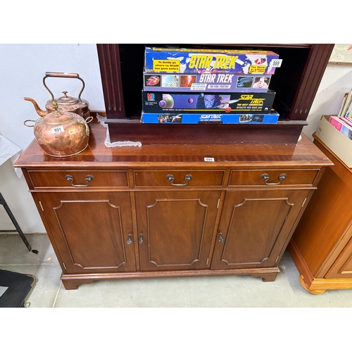 590 - A dark wood stained 3 drawer 3 door wall unit