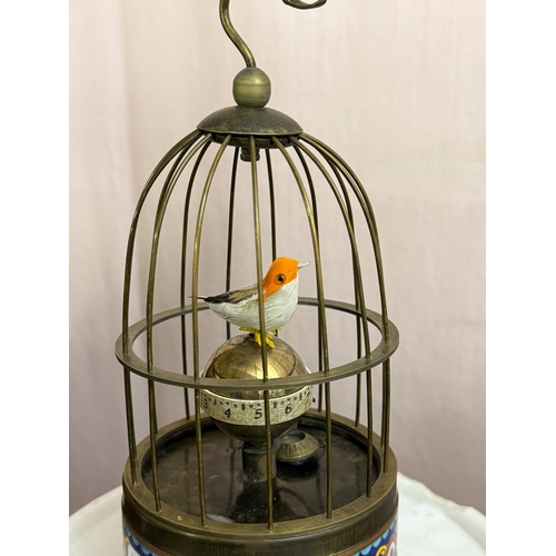 606 - A brass & cloisonne enamel bird cage clock