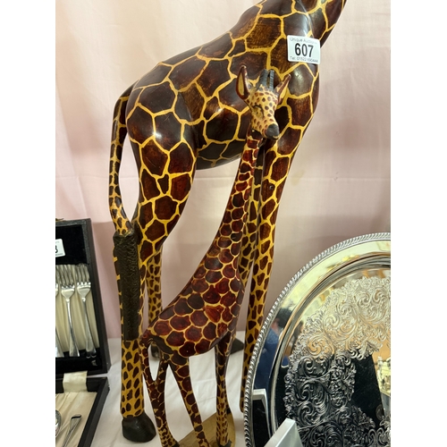 607 - 2 realistic carved wooden giraffes, height 90cm & 44cm