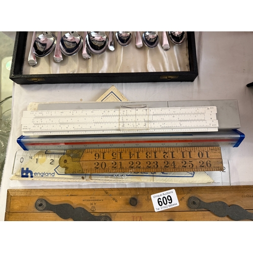 609 - A selection of vintage measuring rulers