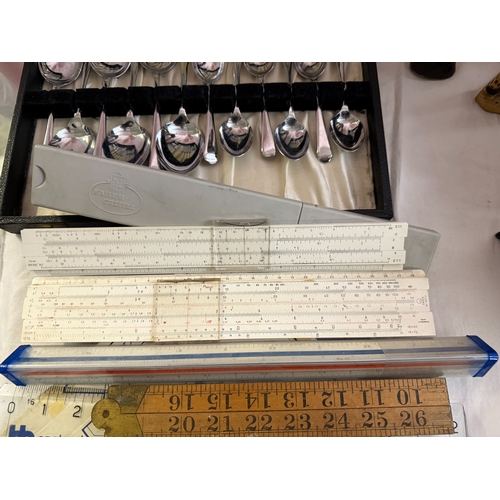 609 - A selection of vintage measuring rulers