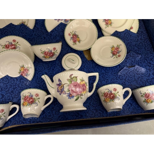 614 - A vintage boxed Ellar decorated pottery tea set with floral design (missing jug)