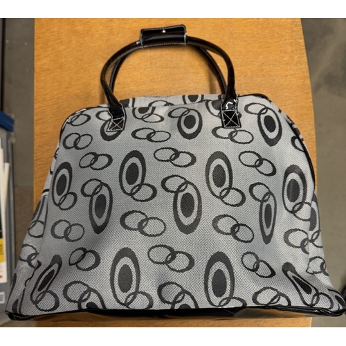 647 - A lovely new black & grey ladies holdall with patent handles & base