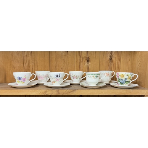 660 - An assortment of cups & saucers