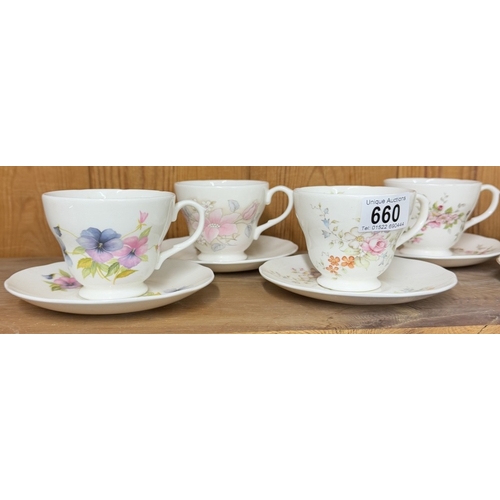 660 - An assortment of cups & saucers