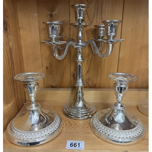 661 - A silver plate candelabra and a pair of silver plate candlesticks.