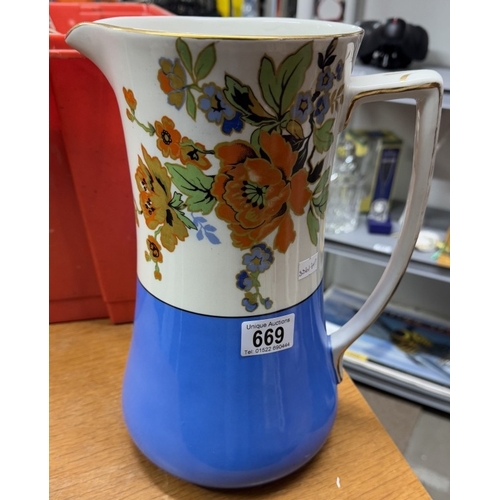 669 - A vintage Tams ware jug, bowl & potty (jug has small chip)