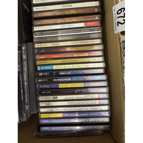 672 - A good lot of CD's & DVD's