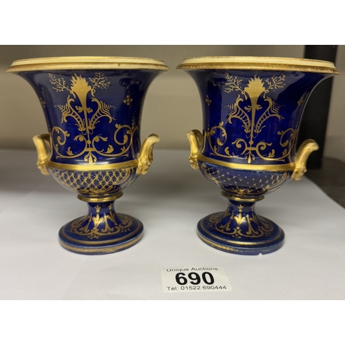 690 - A pair of European miniature urns with floral decoration (unmarked)