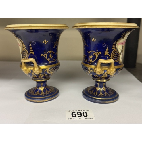 690 - A pair of European miniature urns with floral decoration (unmarked)