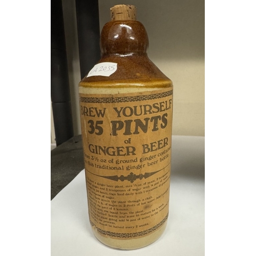 691 - A stoneware Usborne ginger beer bottle with rare paper label