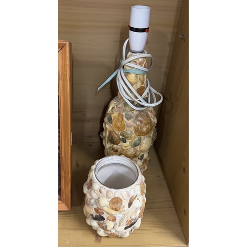 712 - A selection of shell encrusted bottles etc including pine cabinet of sea shells & German beer stein