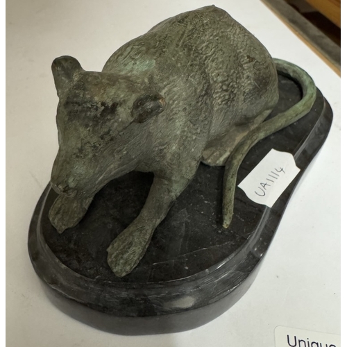 722 - A bronze rat on a polished stone base