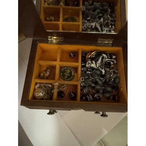 729 - 4 boxes of costume jewellery, badges & necklaces etc.