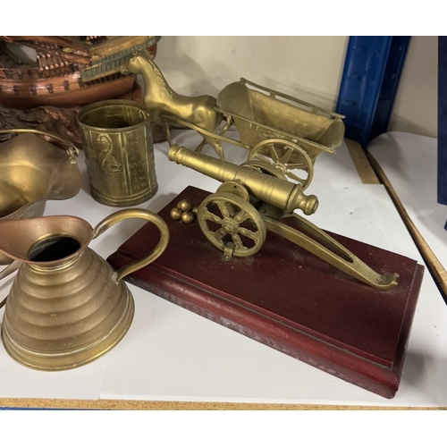 738 - A good selection of mixed metalware including silver plate, brass cannon etc