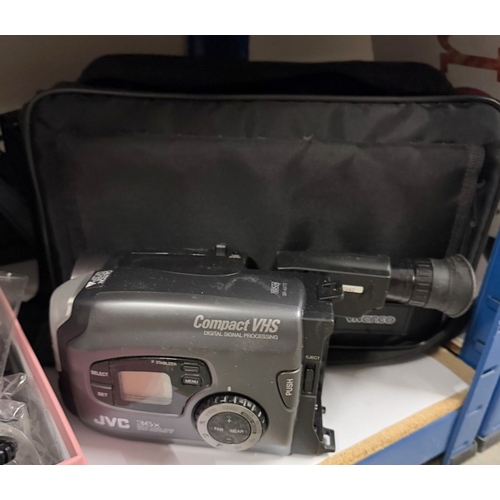 740 - A Fuji video camera, tripod, slide viewer etc