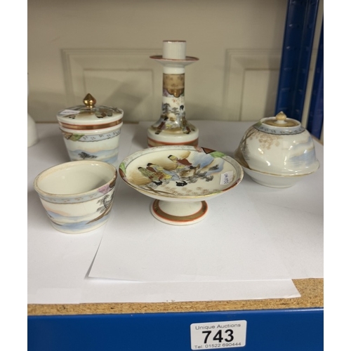 743 - An oriental porcelain dressing table set.