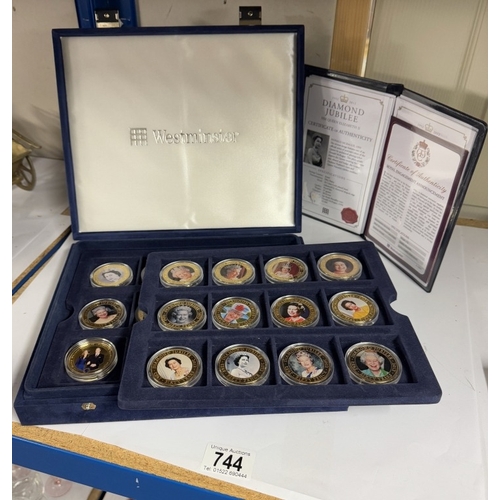 744 - 22 cased 1952-2012 Diamond Jubilee gold plate coins, A Royal Engagement coin and Roman Army coin.