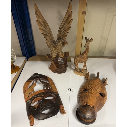 747 - 2 wooden masks & 2 other wooden animals