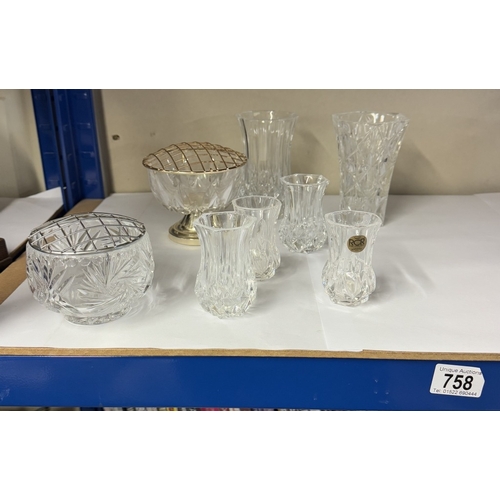 758 - A selection of cut glass including posy vases