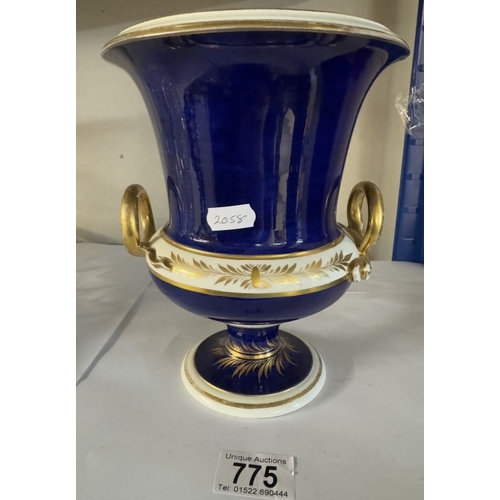 775 - A Derby cobalt ground vase of campana form with gilt snake handles, painted with a traveller in a wo... 