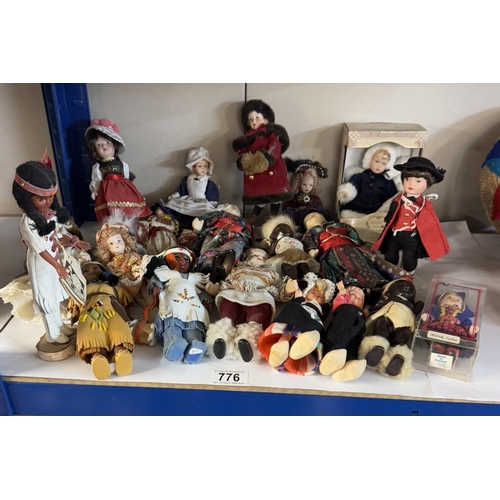 776 - A collection of tourist costume dolls