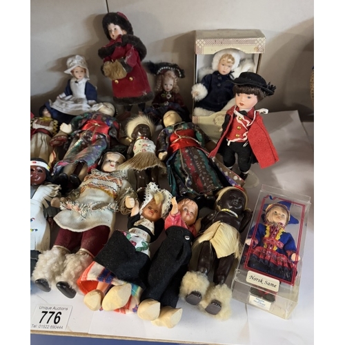 776 - A collection of tourist costume dolls