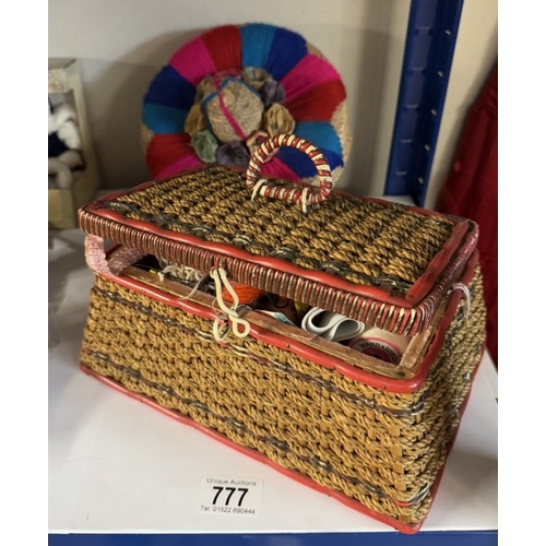 777 - A mid 20th century sewing box with contents, in good condition.