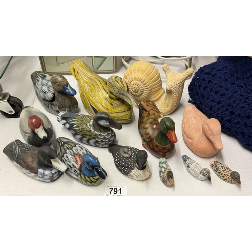 791 - A good selection of duck ornaments & a Snail