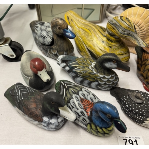 791 - A good selection of duck ornaments & a Snail