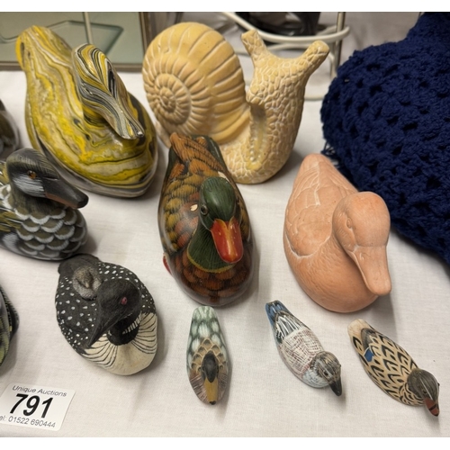 791 - A good selection of duck ornaments & a Snail