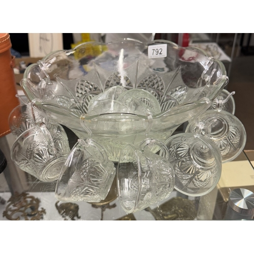 792 - A glass punch bowl with cups.