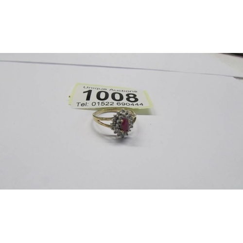 1008 - A yellow gold ruby and diamond ring, size L. 1.78 grams.