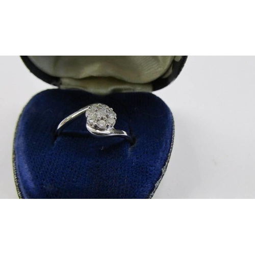 1013 - A 9ct gold half carat diamond ring, size O half, 1.95 grams.