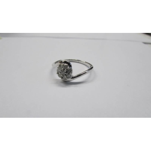 1013 - A 9ct gold half carat diamond ring, size O half, 1.95 grams.