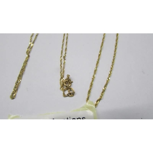 1024 - Three fine 9ct gold chains, 3.35 grams.