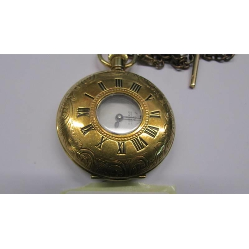 1026 - A half-hunter pocket watch on chain.