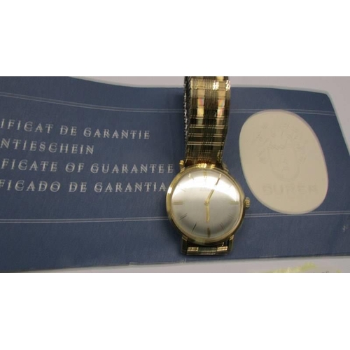 1028 - A Buren gent's wrist watch with guarantee and a Citizen Quartz gent's wrist watch (loose back).