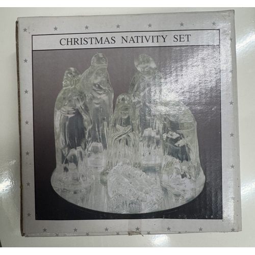 806 - 2 Boxes of Christmas decorations including Nativity Scenes and large baubles