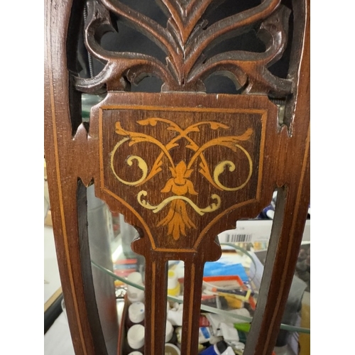 812 - An Edwardian inlaid bedroom chair