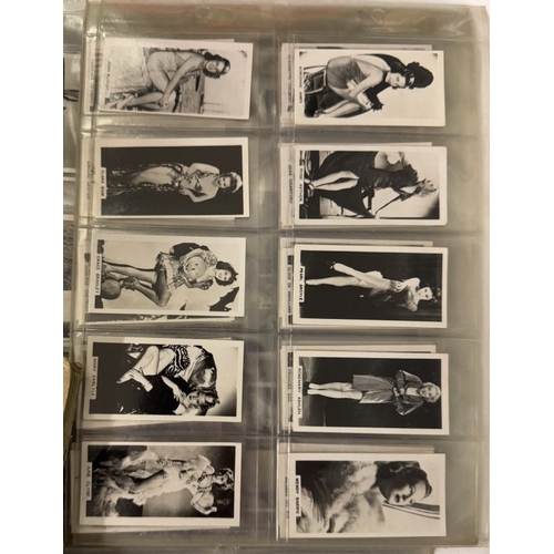 814 - A quantity of albums of early & vintage cigarette cards