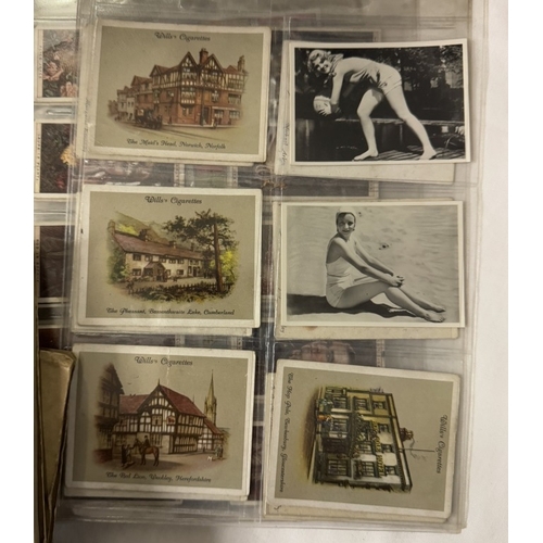 814 - A quantity of albums of early & vintage cigarette cards