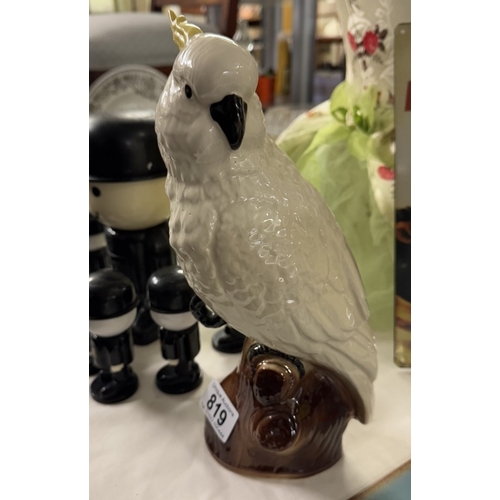 819 - A large unbranded ceramic cockatoo parrot bird. Hight 29cm