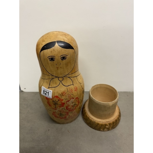 821 - A large wooden Russian doll bottle holder