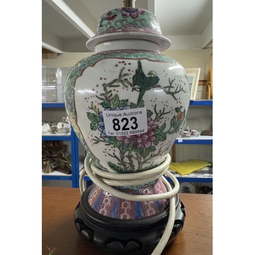 823 - An oriental ginger jar style table lamp