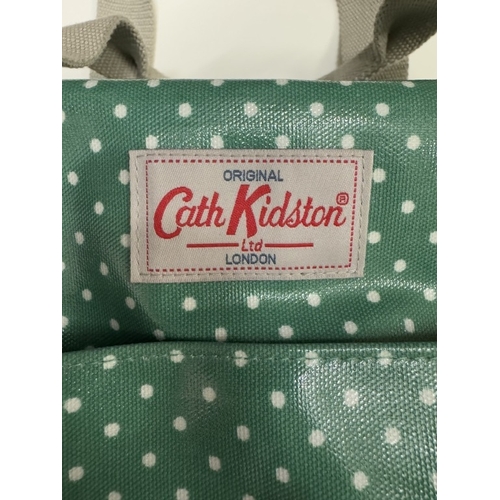 830A - A green polka dot Cath Kidston bag